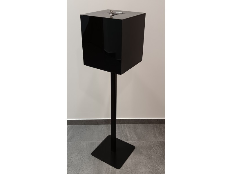 Black acrylic box with lock on metal base